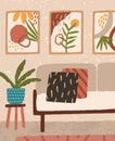 Cozy living room interior design with comfortable couch with pillows, cute posters on the wall and houseplant. Colorful