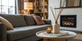 Interior of cozy living room with grey sofa and reed diffuser on coffee table Royalty Free Stock Photo