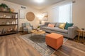 cozy living room with plush carpet and throw pillows, perfect for curling up and reading a good book