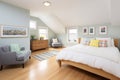 cozy loft bedroom in modernized saltbox interior Royalty Free Stock Photo