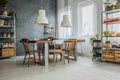 Cozy loft with dinning table Royalty Free Stock Photo