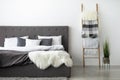 Cozy modern bedroom design and minimalist home style, blog about interior and designer work Royalty Free Stock Photo