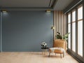 Cozy modern living room interior with leather armchair and decoration room on empty dark blue wall background Royalty Free Stock Photo