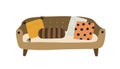 Cozy modern sofa with cushions in retro style. Front view of trendy couch and pillows. Divan with upholstery and wooden