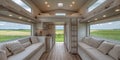 Cozy and modern tiny house interior with a spacious open design and scenic views of grassy fields Royalty Free Stock Photo