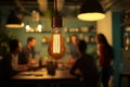 A cozy modern workspace illuminated edison bulb highlights collaborative brainstorming session Royalty Free Stock Photo