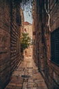 Cozy narrow small Street in the Old City of Jerusalem, Israel. Typical stoned houses and walls of jewish historic Royalty Free Stock Photo