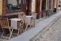 The cozy narrow streets of an old European city with cafes