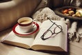 Cozy Open Book with Coffee and Glasses