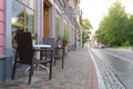 Cozy outdoor cafe in Latvia. Street view, outdoor summer restaurant Royalty Free Stock Photo