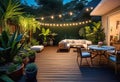 Cozy patio in the back garden with wooden decking, tropical plants and plunge pool. modern design of a place to relax at home, Royalty Free Stock Photo