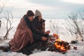 Cozy picnic in the cold season with tea and a blanket