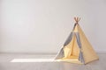 Cozy play tent for kids as element of nursery interior