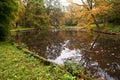 Cozy pond and colorful trees in autumn Royalty Free Stock Photo