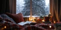 A Cozy Reading Nook with an Open Book a Cup of Tea and Soft Lighting for Winter Relaxation Royalty Free Stock Photo