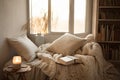 cozy reading nook with soft blankets, cushions, and a good book