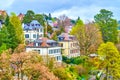 Cozy residential houses in lush greenery on the slope of Aare river in Bern, Switzerland