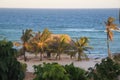 Cozy resort house with coconut trees on the shores of the Indian Ocean in Kenya. Royalty Free Stock Photo