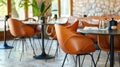 Elegant Restaurant Interior: Modern Brown Leather Chairs and Tables Royalty Free Stock Photo