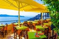 Overlooking seaside restaurant seating Santorini island Greece Royalty Free Stock Photo