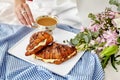 Cozy romantic breakfast in bed with croissants and coffee Royalty Free Stock Photo