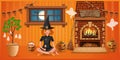 Cozy room with fireplace decorated for Halloween