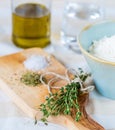 Cozy rustic home kitchen still life, dried herbs thyme, salt.