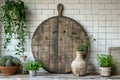Cozy rustic vintage kitchen interior with empty round wooden cutting board on table