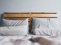 Cozy simple loft wooden bed.