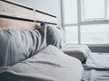 Cozy simple loft wooden bed.