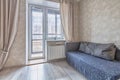 Cozy small studio apartment interior in daylight Royalty Free Stock Photo