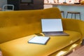 Cozy sofa with laptop and graphics tablet. Royalty Free Stock Photo