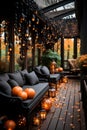 Cozy sofas on the terrace of a house decorated for the Halloween holiday Royalty Free Stock Photo