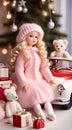 Cozy still life in delicate pink with charming Christmas doll girl, lantern and balls of yarn next to the white Christmas tree