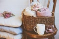cozy still life interior details. Organizing clothes in wicker baskets Royalty Free Stock Photo