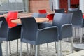 Cozy street restaurant. Tables and chairs in the street. Royalty Free Stock Photo