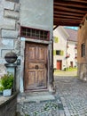 Wooden door on a cozy street of Bregenz upper town - Oberstadt Royalty Free Stock Photo