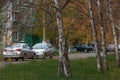 Cozy streets of the city of Bratsk among the falling leaves on a warm autumn day