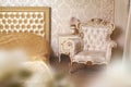 Cozy stylish vintage corner of the ivory bedroom