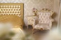Cozy stylish vintage corner of the ivory bedroom