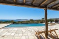 Cozy sun loungers on the mediterranean  terrace with swimming pool near sea Royalty Free Stock Photo