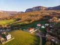 Cozy Swiss village. A carefree life among mountains, green fields and beautiful nature. Household and farming. Royalty Free Stock Photo