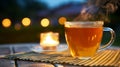 Cozy Warm Tea Evening Outdoors with Candlelight Ambience Royalty Free Stock Photo