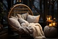 Cozy warm winter composition with soft pillows, cozy blanket and snowy landscape on winter day. Winter home decor. Christmas. New Royalty Free Stock Photo