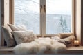 a cozy window seat with a view of a peaceful snow landscape