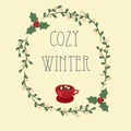 Cozy winter. Hand lettering text in a wreath