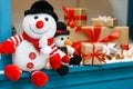 Cozy christmas background. Toy snowmen and presents under new year tree Royalty Free Stock Photo