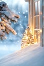 Cozy winter scene with lit christmas tree by a snowy window during twilight Royalty Free Stock Photo