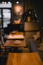 Cozy wooden interior of restaurant. Comfortable modern dining place, contemporary design background Royalty Free Stock Photo