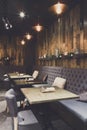 Cozy wooden interior of restaurant, copy space Royalty Free Stock Photo